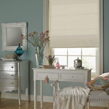 dotted ivory roman blinds