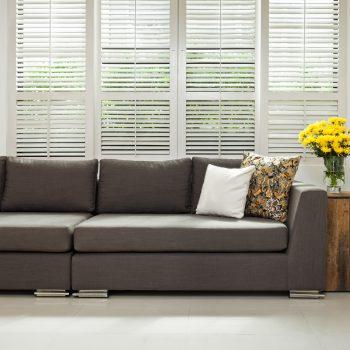 Grey sofa in simple setting